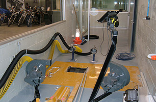 Twin exhaust fume extraction for motorcycles