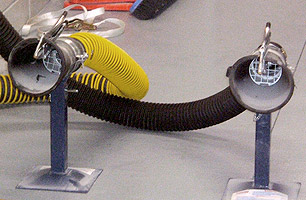 Close up of twin exhaust fume extraction for motorcycles