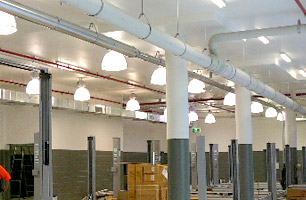 Workshop lighting and ventilation systems for automotive service workshops