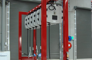 lubrication hose reels in single gantry along side prefabricated workshop pit