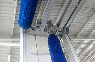 Wash System installed at Busways Penrith depot showing top & side rollers