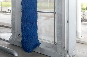 Wash System installed at Busways Penrith depot showing side roller and guide rails